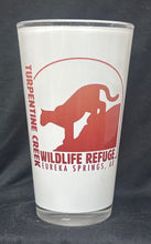 Load image into Gallery viewer, Cat on a Rock Pint Glass
