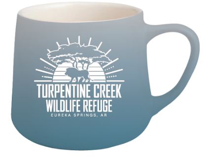 Blue Lion Walking at Sunset Mug